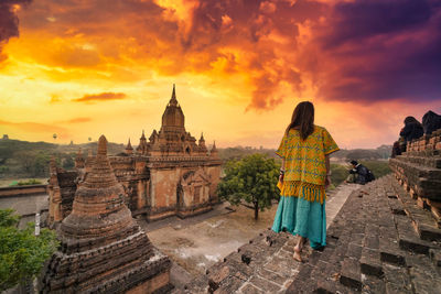 Panoramic view of temple against sky during sunset