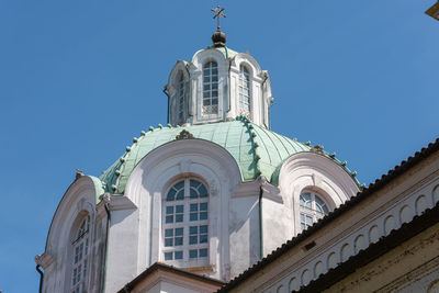 Low angle view of building against blue sky