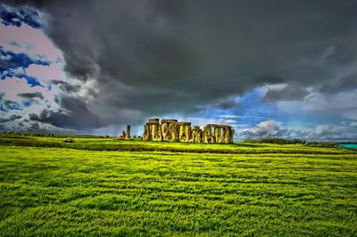 Landscape against cloudy sky