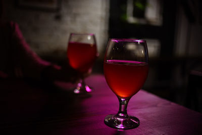 Close-up of wineglass on table