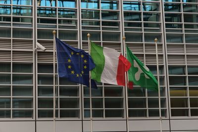Low angle view of flags in the wind