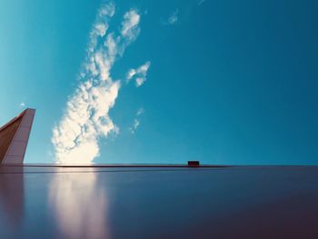 Low angle view of building against blue sky