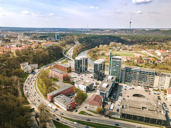 High angle view of street amidst buildings in city