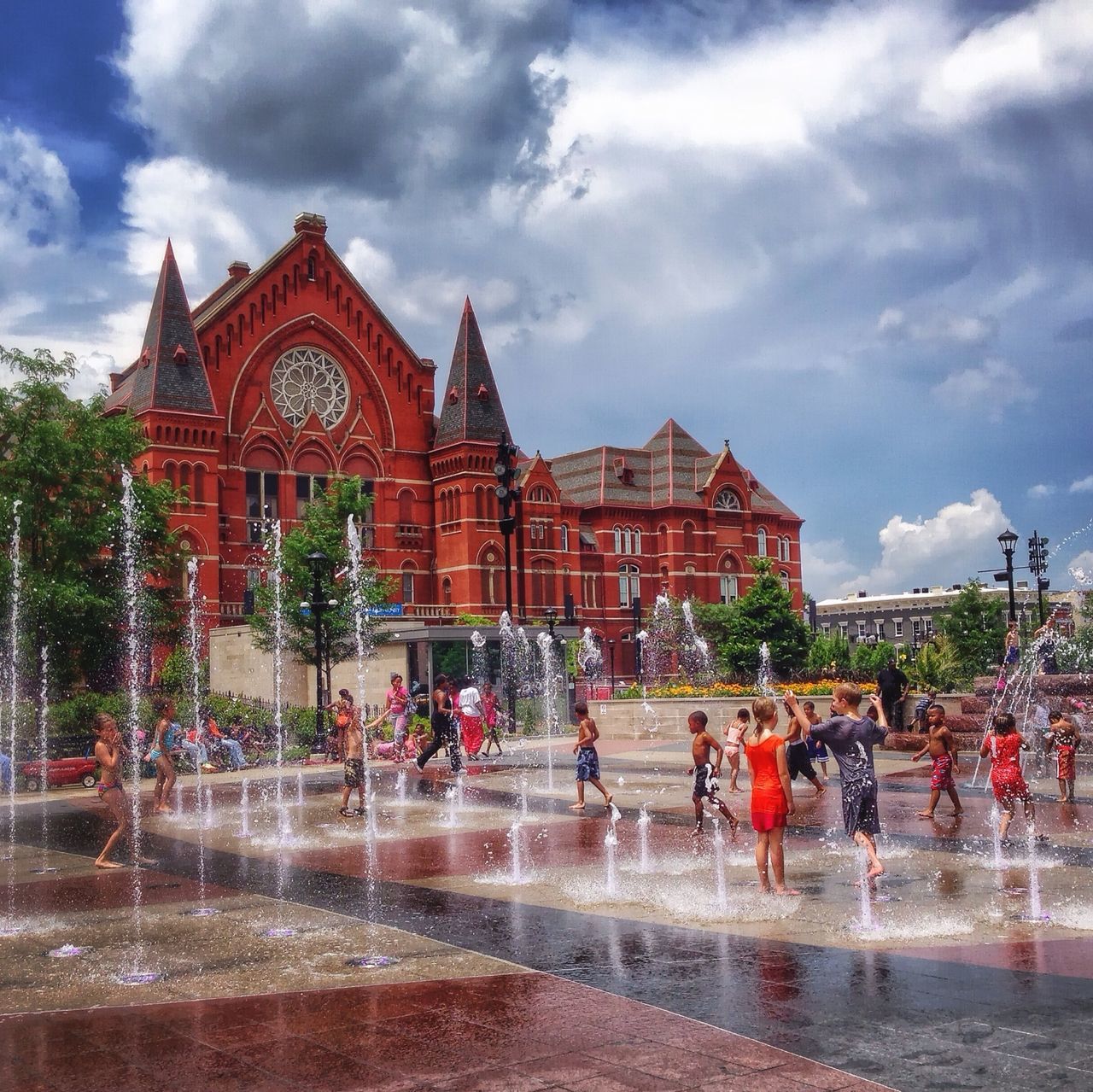 architecture, built structure, building exterior, sky, cloud - sky, large group of people, person, fountain, cloudy, men, cloud, travel destinations, famous place, tourism, mixed age range, travel, lifestyles, facade, history