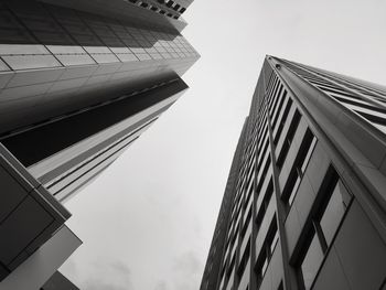 Low angle view of modern buildings against sky