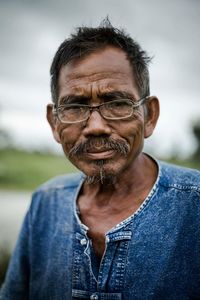 Portrait of smiling mid adult man