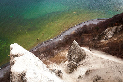 High angle view of river amidst mountains