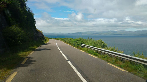 Empty road against sky