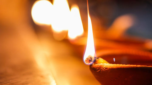 Close-up of lit candle