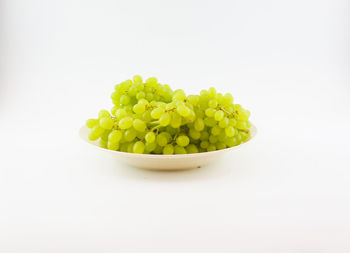 Close-up of fruits against white background