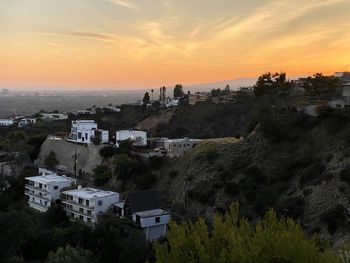 High angle view of townscape against sky during sunset