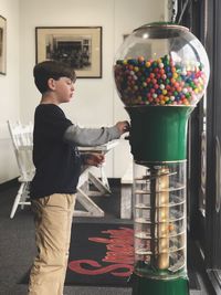 Boy standing in living room