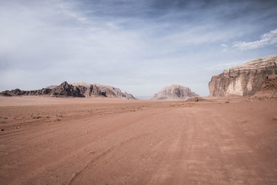 View of dirt road in desert