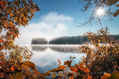 Scenic view of lake against sky during autumn