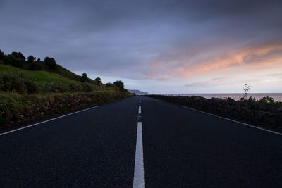 Empty country road along landscape