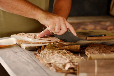 Making cuban cigars by hand in vinales, cuba.