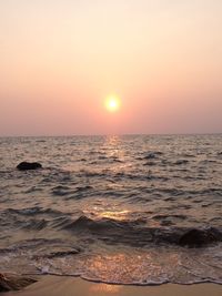 Scenic view of sea against clear sky during sunset