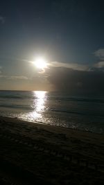 Scenic view of sea against sky at sunset