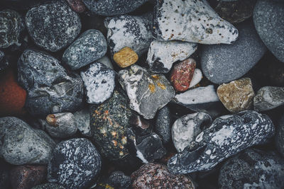Full frame shot of wet pebbles