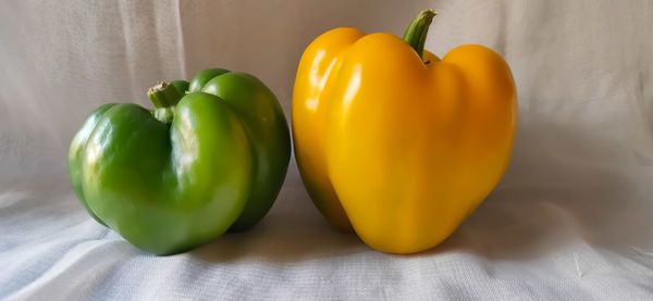 Close-up of yellow bell peppers on table