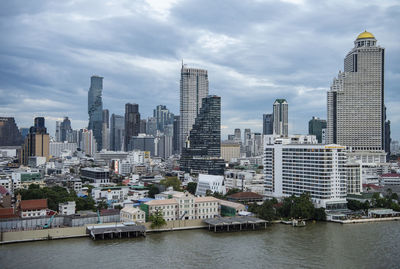 Buildings in city against sky