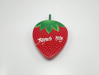 Close-up of heart shape over white background