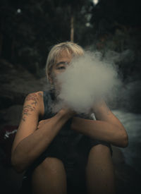 Woman smoking pod