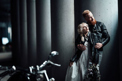 Couple standing in corridor