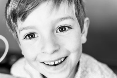 Close-up portrait of smiling boy