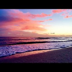 Scenic view of sea at sunset