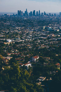 Aerial view of cityscape against sky