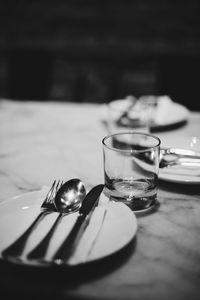 Close-up of glasses on table