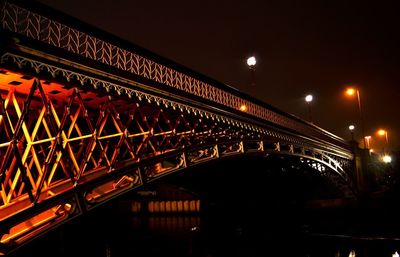 Low angle view of bridge at night