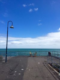 Scenic view of sea against blue sky