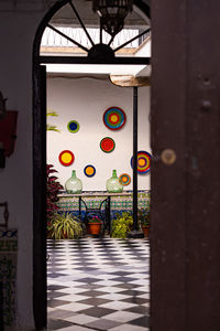 Footpath seen through metal door of building