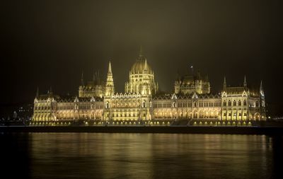 Illuminated city lit up at night