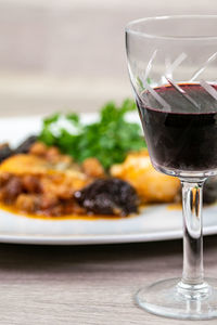 Close-up of drink served on table