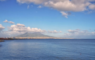 Scenic view of sea against cloudy sky