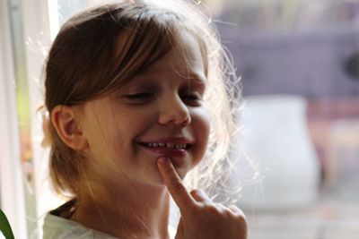 Close-up portrait of a smiling girl