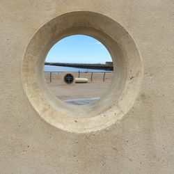 Buildings seen through hole