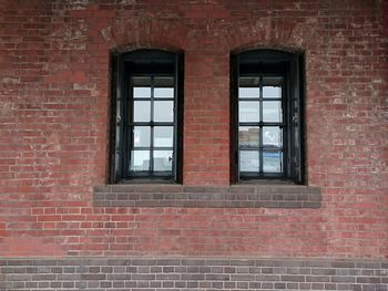 Window of red brick wall