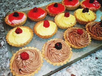 High angle view of cupcakes on table