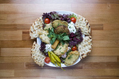 High angle view of fruits in plate on table