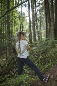 Full length of woman in forest