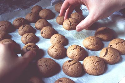 Close-up of hand holding cookies