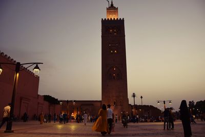 Group of people in front of building