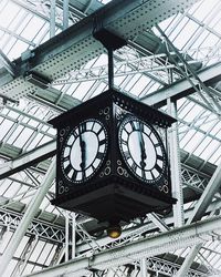 Low angle view of clock tower at railroad station