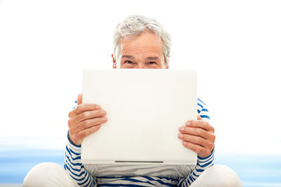 Close-up of man holding ice cream