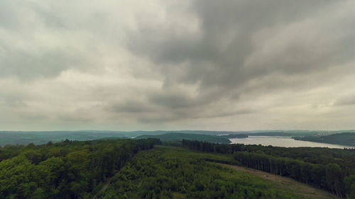 Scenic view of sea against cloudy sky