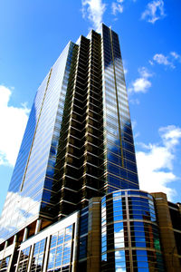 Low angle view of modern building against sky